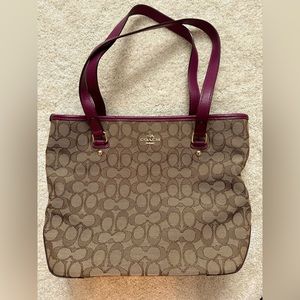 Brown coach purse with burgundy accents